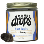 Close-up of Eat Honey Drops Bee Legit packaging featuring a honey bee and natural honey-themed design.