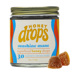 Eat Honey Drops Sunshine Mane confection, colorful candy treats with bright yellow and orange hues, showcasing vibrant, playful packaging.