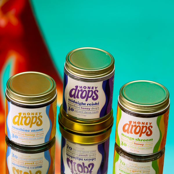 Assorted Eat Honey Drops flavor bundle featuring colorful honey drop candies in a clear container.