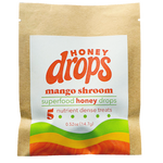 Eat Honey Drops Mango Shroom confection showing colorful mango-flavored mushroom candy in a clear wrapper.